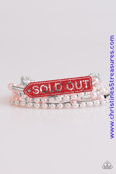 Pearly pink beads and silver accents are threaded along elastic stretchy bands, creating refined layers across the wrist. Sold as one set of six bracelets.  P9RE-PKXX-087XX