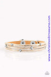 Brushed in a metallic shimmer, brown leather bands layer around the wrist. Glittery white rhinestone accents are sprinkled across the dainty bands, adding a dazzling finish to the glamorous palette. Features an adjustable snap closure. Sold as one individual bracelet.  P9DI-URBN-053XX