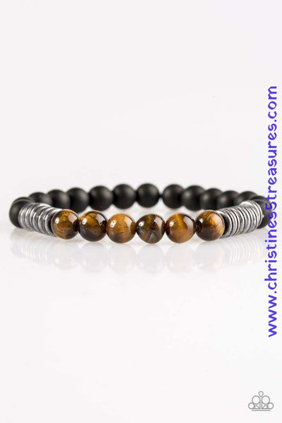 Infused with antiqued metallic accents, smooth black and energetic tiger's eye stone beads are threaded along a stretchy elastic band for a seasonal look. Sold as one individual bracelet.  P9SE-URBN-265XX
