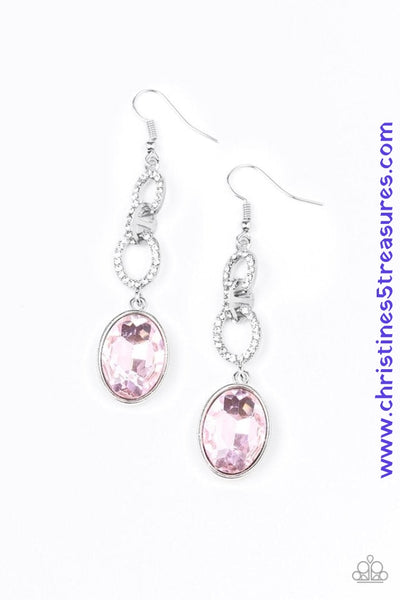 A dramatically oversized pink gem swings from the bottom of white rhinestone encrusted silver links, creating a glamorous lure. Earring attaches to a standard fishhook fitting. Sold as one pair of earrings.  P5RE-PKXX-199XX