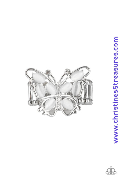 Dotted with glittery white rhinestones, a white moonstone encrusted butterfly perches atop the finger for a whimsical flair. Features a stretchy band for a flexible fit. Sold as one individual ring.  P4WH-WTXX-115XX