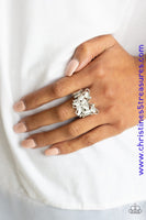 Dotted with glittery white rhinestones, a white moonstone encrusted butterfly perches atop the finger for a whimsical flair. Features a stretchy band for a flexible fit. Sold as one individual ring.  P4WH-WTXX-115XX