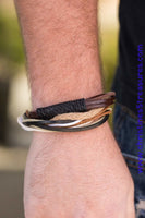 A mishmash of multicolored cording and black and knotted brown leather bands layer across the wrist for a rugged look. Features an adjustable sliding knot closure. Sold as one individual bracelet.  P9UR-BNXX-277XX