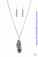 Featuring studded and antiqued textures, a dramatic silver feather pendant swings from the bottom of an elongated silver chain for a free-spirited fashion. Features an adjustable clasp closure. Sold as one individual necklace. Includes one pair of matching earrings.   P2SE-SVXX-091XX