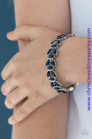 Trios of elegant marquise blue rhinestones delicately join into leafy silver frames along a stretchy band, creating a refined display around the wrist. Sold as one individual bracelet.  P9RE-BLXX-165XX