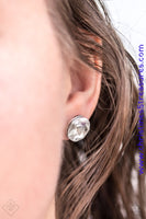 A sparkling white rhinestone is nestled inside a round silver frame for a timeless look. Earring attaches to a standard post fitting. Sold as one pair of post earrings.  P5PO-WTXX-129YD