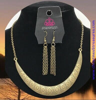 Stamped in tribal inspired patterns, a brass crescent-shaped plate swings from the bottom of a shimmery brass chain, creating a bold pendant below the collar. Features an adjustable clasp closure. Sold as one individual necklace. Includes one pair of matching earrings.  P2TR-BRXX-057XX