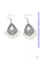 A pearly white fringe swings from the bottom of an ornate silver frame radiating with glassy white rhinestones for a refined look. Earring attaches to a standard fishhook fitting. Sold as one pair of earrings.  P5RE-WTXX-351XX