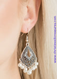 A pearly white fringe swings from the bottom of an ornate silver frame radiating with glassy white rhinestones for a refined look. Earring attaches to a standard fishhook fitting. Sold as one pair of earrings.  P5RE-WTXX-351XX