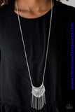 Radiating in linear textures, a glistening silver crescent swings from the bottom of a lengthened silver chain. Shimmery silver chains and flared silver beading swings from the bottom of the tribal inspired pendant, creating a flirtatious fringe. Features an adjustable clasp closure. Sold as one individual necklace. Includes one pair of matching earrings.   P2TR-SVXX-097XX
