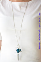 Infused with a lengthened silver chain, an array of glassy blue and shimmery silver accents swing from the bottom of a white rhinestone encrusted frame. A faceted blue heart frame swings from the bottom of the sparkling frame, adding a romantic finish to the whimsical tassel. Features an adjustable clasp closure. Sold as one individual necklace. Includes one pair of matching earrings. P2WH-BLXX-330XX