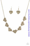 Featuring filigree-filled centers, glistening brass heart frames connect below the collar in a romantic fashion. Features an adjustable clasp closure. Sold as one individual necklace. Includes one pair of matching earrings.  P2WH-BRXX-120VI