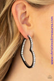 Encrusted in sections of glittery white rhinestones, a glistening gunmetal hoop curls into a charming heart shape for a heart-stopping look. Earring attaches to a standard post fitting. Hoop measures approximately 2" in diameter. Sold as one pair of hoop earrings. P5HO-BKXX-159XX