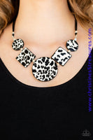 Featuring textured white and gray cheetah print, a wild collection of circle and square leather pieces are threaded along an invisible wire below the collar for a fierce look. Features an adjustable clasp closure. Sold as one individual necklace. Includes one pair of matching earrings. P2ST-WTXX-071XX