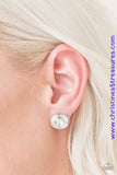 Featuring a regal prism style cut, a dramatic white gem is pressed into a sleek silver frame for a glamorous look. Earring attaches to a standard post fitting. Sold as one pair of post earrings.  P5PO-WTXX-116XX