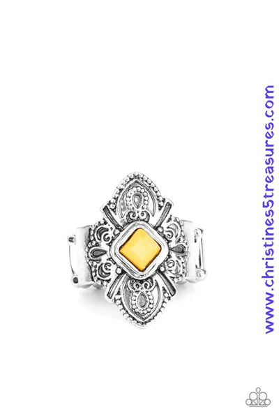 A sunny yellow square bead is pressed into the center of a scalloped silver frame radiating with tribal inspired detail for a seasonal look. Features a stretchy band for a flexible fit. Sold as one individual ring.  P4WH-YWXX-098XX