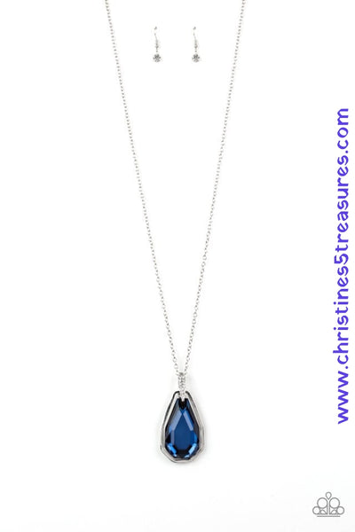A dramatically oversized blue gem and edgy silver frame swing from a glassy white rhinestone fitting at the bottom of a lengthened silver chain for a glamorous look. Features an adjustable clasp closure. Sold as one individual necklace. Includes one pair of matching earrings.  P2RE-BLXX-236XX