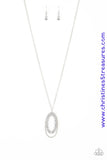 Ringed in a studded silver frame, glittery white rhinestones collect into glamorous pendant at the bottom of a lengthened silver chain for a refined flair. Features an adjustable clasp closure. Sold as one individual necklace. Includes one pair of matching earrings.  P2RE-WTXX-355EL