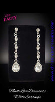 2020 April Life Of The Party Exclusive  Dainty white marquise rhinestone frames drip from a classic white rhinestone fitting. An oversized teardrop rhinestone swings from the bottom for a dramatic finish. Earring attaches to a standard post fitting. Sold as one pair of post earrings.  P5PO-WTXX-242XX