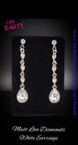 2020 April Life Of The Party Exclusive  Dainty white marquise rhinestone frames drip from a classic white rhinestone fitting. An oversized teardrop rhinestone swings from the bottom for a dramatic finish. Earring attaches to a standard post fitting. Sold as one pair of post earrings.  P5PO-WTXX-242XX