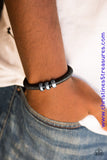 Shiny black twine wraps around a black cord, creating an urban look around the wrist. Shiny SILVER beads slide along the cording for a rugged finish. Features an adjustable sliding knot closure. Sold as one individual bracelet.  P9UR-BKXX-271QB