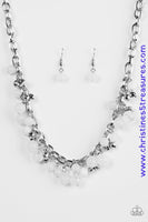 Glassy, opaque, and polished white beads trickle from the bottom of a shimmery silver chain. Faceted silver beads trickle between the colorful beads, adding a splash of shimmer to the summery fringe. Features an adjustable clasp closure. Sold as one individual necklace. Includes one pair of matching earrings. P2WH-WTXX-181XX