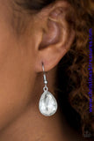 An oversized white rhinestone teardrop drips from the ear in a timeless fashion. Earring attaches to a standard fishhook fitting. Sold as one pair of earrings. P5RE-WTXX-269XX