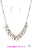 Earthy white stone beading cascades from the bottom of interlocking silver chains, creating an earthy fringe below the collar. Brushed in an antiqued shimmer, textured silver teardrops drip between the colorful beading for an artisan inspired finish. Features an adjustable clasp closure. Sold as one individual necklace. Includes one pair of matching earrings. P2SE-WTXX-147XX
