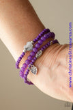 An array of glassy and polished purple beads are threaded along stretchy bands. Infused with silver accents, a collection of silver heart charms and a bead spelling out the word, "love", adorn the beaded strands for a romantic finish. Sold as one set of three bracelets.  P9WH-PRXX-171XX