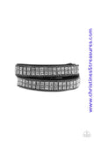 Infused with dainty gunmetal ball chain, glittery hematite rhinestones are sprinkled across a black suede band in a cube like pattern for an edgy look. The elongated band allows for a trendy double wrap design. Features an adjustable snap closure. Sold as one individual bracelet.  P9DI-URBK-172XX