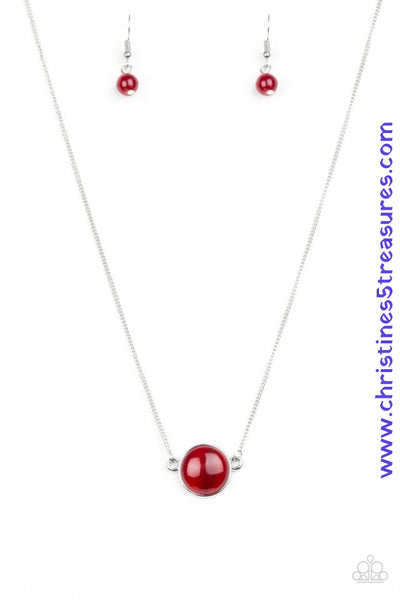 A glassy red bead attaches to a shimmery silver chain, creating a stationary pendant below the collar. Features an adjustable clasp closure. Sold as one individual necklace. Includes one pair of matching earrings.   P2DA-RDXX-073XX