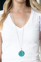 Featuring a faux stone finish, an earthy blue frame swings behind two shimmery silver rings at the bottom of a lengthened silver chain, creating a colorfully stacked pendant. Features an adjustable clasp closure. Sold as one individual necklace. Includes one pair of matching earrings.  P2SE-BLXX-414XX