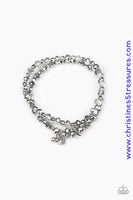 Hematite and smoky crystal-like beads and faceted silver beads are threaded along stretchy elastic bands. Matching gunmetal beads swing from the wrist, creating clustered centerpieces. Sold as one set of two bracelets.  P9RE-SVXX-188GR