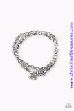 Hematite and smoky crystal-like beads and faceted silver beads are threaded along stretchy elastic bands. Matching gunmetal beads swing from the wrist, creating clustered centerpieces. Sold as one set of two bracelets.  P9RE-SVXX-188GR