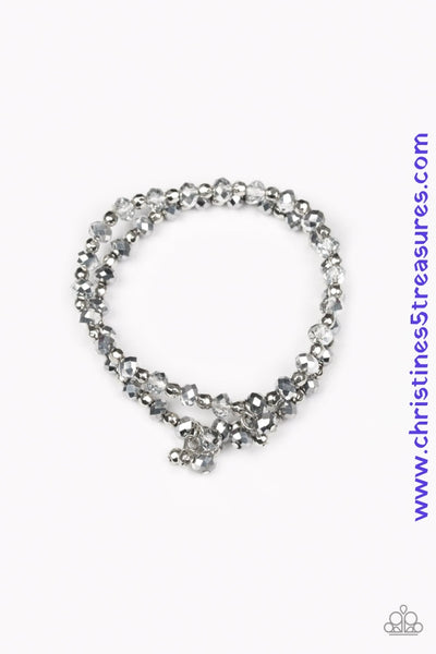 Hematite and smoky crystal-like beads and faceted silver beads are threaded along stretchy elastic bands. Matching gunmetal beads swing from the wrist, creating clustered centerpieces. Sold as one set of two bracelets.  P9RE-SVXX-188GR