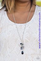 Faceted black, gunmetal, and iridescent crystal beads trickle from the bottom of a lengthened silver chain, creating a clustered pendant. Infused with classic silver beads, a faceted black teardrop swings from the bottom of the glittery pendant for a whimsical finish. Features an adjustable clasp closure. Sold as one individual necklace. Includes one pair of matching earrings.  P2WH-BKXX-162XX