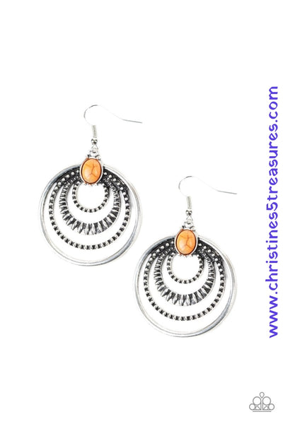 Textured silver hoops ripple from an energetic orange stone, creating a dizzying frame. Earring attaches to a standard fishhook fitting. Sold as one pair of earrings.  P5SE-OGXX-096XX