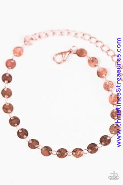 Brushed in an antiqued finish, flat copper discs link across the wrist in an undeniably shimmery fashion. Features an adjustable clasp closure. Sold as one individual bracelet.  Get The Complete Look! Necklace: “Let There Be SPOTLIGHT - Copper” (Sold Separately)  P9WH-CPXX-069IO