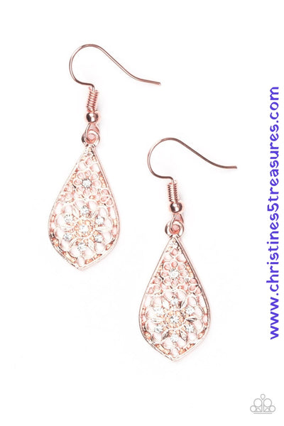Glittery white rhinestones are sprinkled across a dainty floral frame, creating a whimsical lure. Earring attaches to a standard fishhook fitting. Sold as one pair of earrings.   P5WH-CPSH-090XX