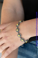 Dotted with sunny Illuminating beaded centers, dainty floral embossed silver frames delicately link around the wrist for a colorful springtime look. Features an adjustable clasp closure. Sold as one individual bracelet.  P9DA-YWXX-025XX