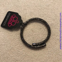 Bedazzled in glittery hematite rhinestones, a bendable cuff-like bracelet delicately curls around the wrist for a refined look. Sold as one individual bracelet.  P9RE-BKXX-273XX