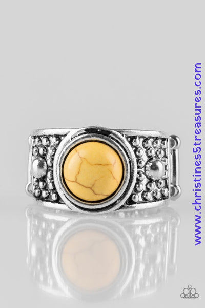 A sunny yellow stone is pressed into the center of an antiqued silver frame radiating with studded textures for an artisan inspired look. Features a stretchy band for a flexible fit. Sold as one individual ring.  P4SE-YWXX-050XX