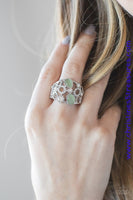 Shimmery silver frames, glassy white rhinestones, and glowing green moonstones coalesce across the finger, creating a bubbly frame. Features a stretchy band for a flexible fit. Sold as one individual ring.  P4RE-GRXX-095XX