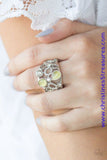 Shimmery silver frames, glassy white rhinestones, and glowing yellow moonstones coalesce across the finger, creating a bubbly frame. Features a stretchy band for a flexible fit. Sold as one individual ring.  P4RE-YWXX-034XX