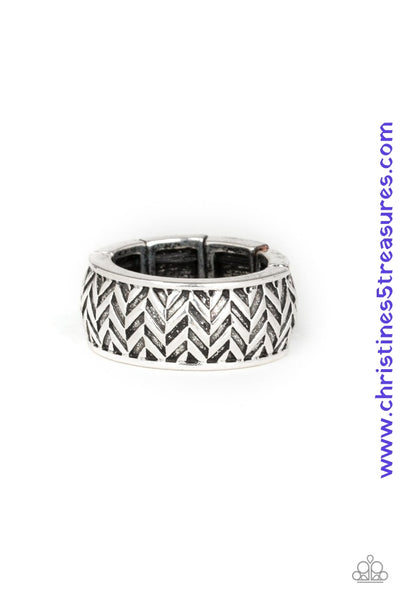 Brushed in an antiqued finish, stacked rows of chevron-like patterns are etched and embossed across a thick silver band for a tactile look. Features a stretchy band for a flexible fit. Sold as one individual ring.  Fits most 10-12  P4MN-URSV-006XX