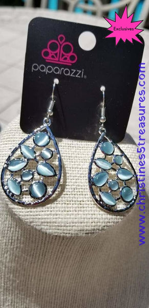 2018 July Fashion Fix Exclusive Varying in shape, glassy blue moonstones are sprinkled across the center of a silver teardrop, creating a whimsical lure. Earring attaches to a standard fishhook fitting. Sold as one pair of earrings.  P5RE-BLXX-302XX