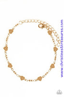 Flat gold hearts link around the wrist, creating a casually dainty palette. Features an adjustable clasp closure. Sold as one individual bracelet.  Get The Complete Look! Necklace: “Fierce Hearts - Gold” (Sold Separately)  P9DA-GDXX-126NG