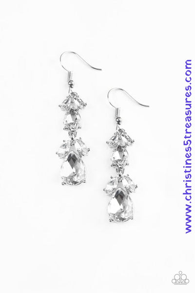 Featuring regal marquise and teardrop style cuts, glassy white rhinestones gradually increase in size as they trickle from the ear, coalescing into a timeless lure. Earring attaches to a standard fishhook fitting. Sold as one pair of earrings. P5RE-WTXX-300XX