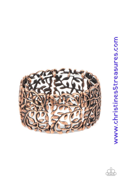 Brushed in an antiqued shimmer, leafy copper filigree frames are threaded along stretchy bands around the wrist for a vintage inspired look. Sold as one individual bracelet.  P9ST-CPXX-007XX