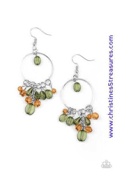 A tranquil collection of glassy green and brown crystal-like beads dangle from a dainty silver hoop, creating a whimsical lure. Earring attaches to a standard fishhook fitting. Sold as one pair of earrings.  P5WH-MTXX-158XX